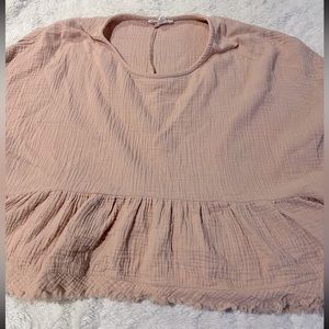 Cropped peplum style top